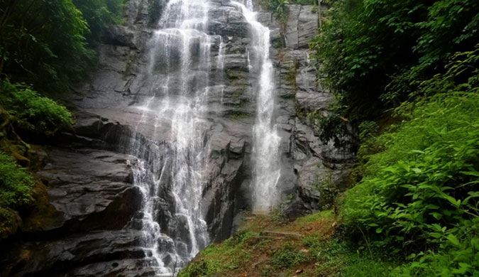 Aruvikkachal Waterfalls natural scenic spot near Time Square Inn